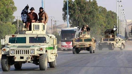 حرب نفسية.. امريكا تحرض اهالي الرقة على داعش برسم كاريكاتير صورة رقم 4 حرب نفسية.. امريكا تحرض اهالي الرقة على داعش برسم كاريكاتير صورة رقم 4