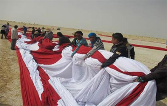 تونيس تقتحم موسوعة غنيس الشهيرة باكبر علم في العالم صورة رقم 4