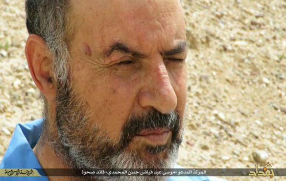 بالصور.. مجرمو داعش يعدمون 10 عراقيين وهذه المرة برداء ازرق صورة رقم 1