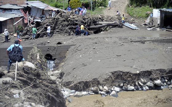 انهيار أرضي يزيل قرية كولومبية من الخارطة ويقتل العشرات صورة رقم 10