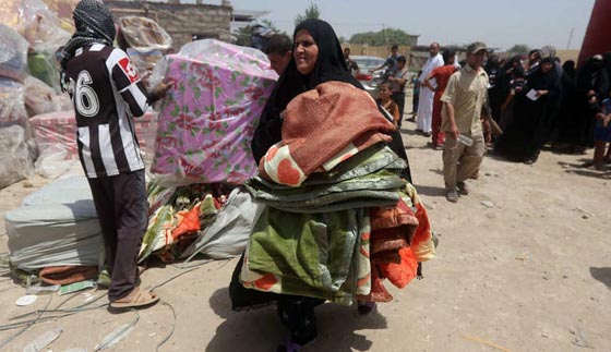 بالصور.. عراقيون يفرون من جحيم داعش في الانبار الى نعيم التشرد  صورة رقم 3