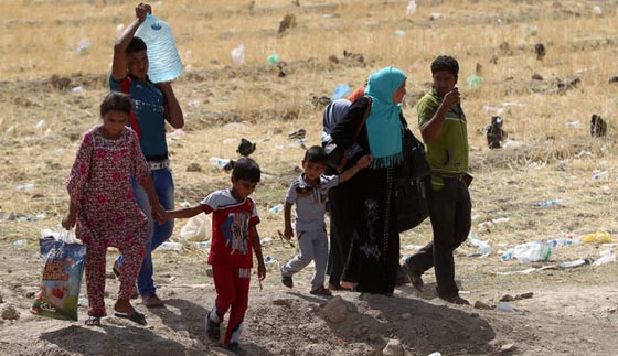 بالصور.. عراقيون يفرون من جحيم داعش في الانبار الى نعيم التشرد  صورة رقم 6