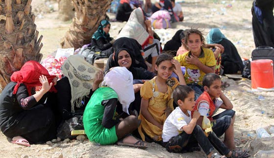 بالصور.. عراقيون يفرون من جحيم داعش في الانبار الى نعيم التشرد  صورة رقم 7