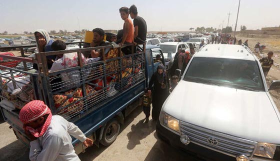 بالصور.. عراقيون يفرون من جحيم داعش في الانبار الى نعيم التشرد  صورة رقم 9