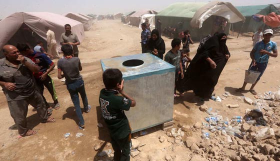 بالصور.. عراقيون يفرون من جحيم داعش في الانبار الى نعيم التشرد  صورة رقم 11