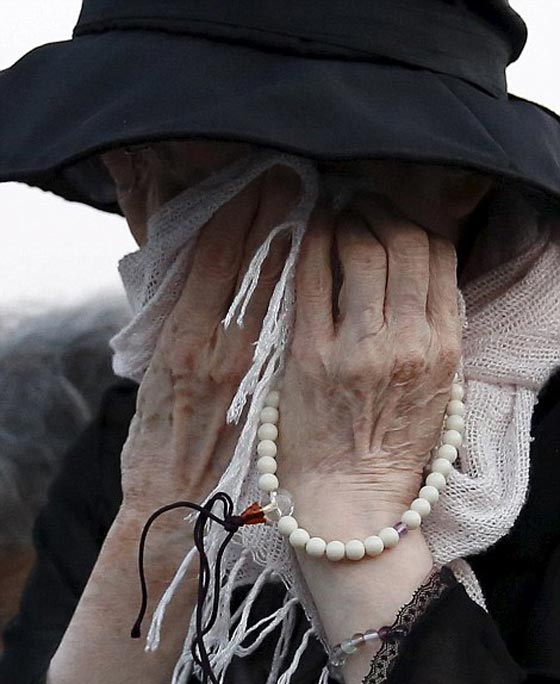 شاهدة على القنبلة النووية: رأيت سحابة الفطر ونهرا مليئا بالجثث! صورة رقم 9