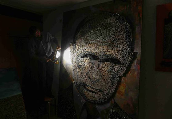 وجه الحرب.. فنانة ترسم وجه بوتين برصاص جمعته من مناطق النزاع صورة رقم 10 وجه الحرب.. فنانة ترسم وجه بوتين برصاص جمعته من مناطق النزاع صورة رقم 10