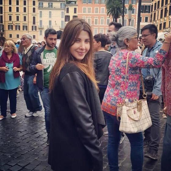 صور نانسي عجرم مع زوجها وابنتيها ايلا وميلا بدون فوتوشوب صورة رقم 30