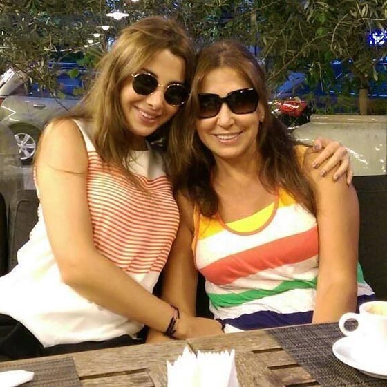 صور نانسي عجرم مع زوجها وابنتيها ايلا وميلا بدون فوتوشوب صورة رقم 51