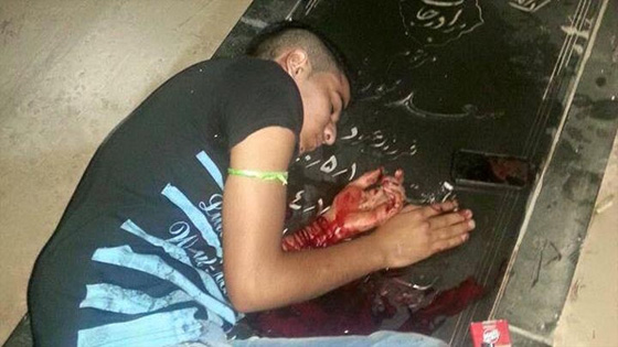 صورة مؤثرة.. فتى عربي ينتحر فوق قبر والده بسبب الفقر صورة رقم 1 صورة مؤثرة.. فتى عربي ينتحر فوق قبر والده بسبب الفقر صورة رقم 1