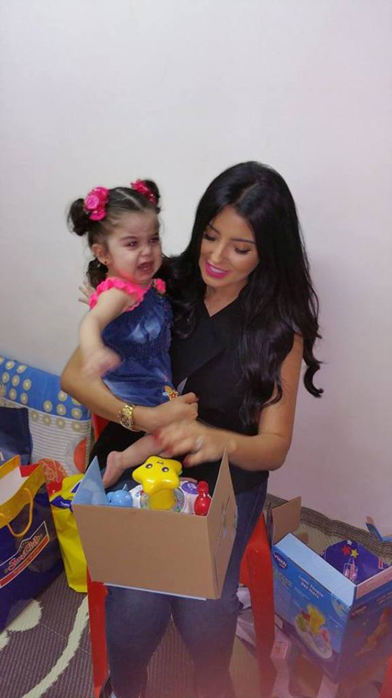 ملكة جمال عربية تتحدى الحرب وتتكفل برعاية طفلة سورية صورة رقم 3