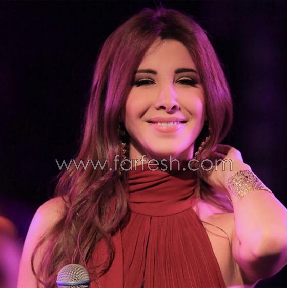 صور نانسي عجرم تشعل أجواء المغرب وتتألق بفستان احمر يفيض انوثة واناقة  صورة رقم 7