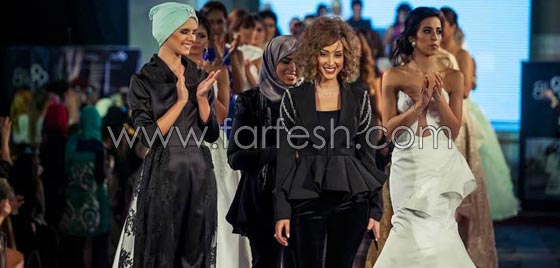 صور تامر حسني يغني في حفل تخرج زوجته بسمة بوسيل من اكاديمية الازياء صورة رقم 14