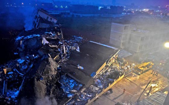 انهيار ارضي يخلف 8 قتلى و 41 مفقودا بمجمع صناعي في الصين صورة رقم 3