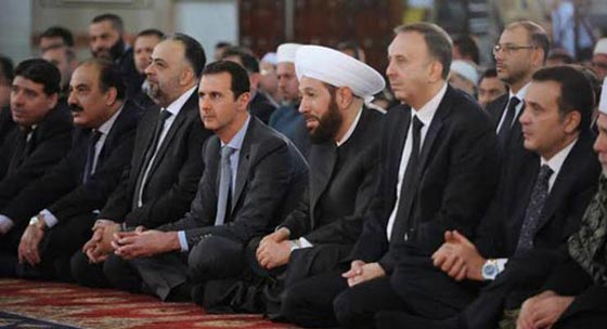 بعد احتفاله بالميلاد.. الاسد يحيي ذكرى المولد النبوي في دمشق صورة رقم 3 بعد احتفاله بالميلاد.. الاسد يحيي ذكرى المولد النبوي في دمشق صورة رقم 3