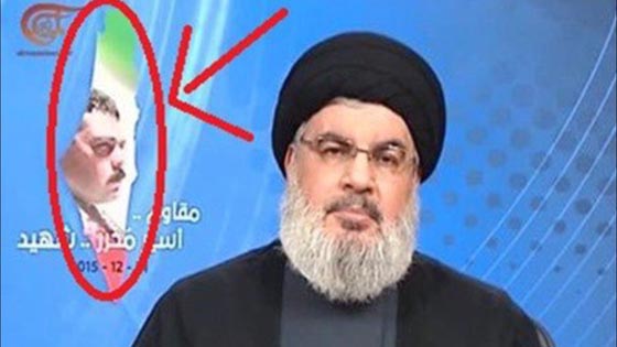 نصرالله يجمع بين العلم الايراني وخريطة فلسطين خلال خطابه عن القنطار صورة رقم 1 نصرالله يجمع بين العلم الايراني وخريطة فلسطين خلال خطابه عن القنطار صورة رقم 1