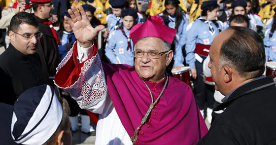 مسيحيو العالم العربي يضيئون شمعة العيد في بحر من الاحزان صورة رقم 2