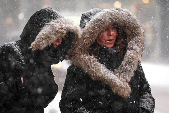 صور عاصفة ثلجية غير مسبوقة توقف الحياة في امريكا صورة رقم 35
