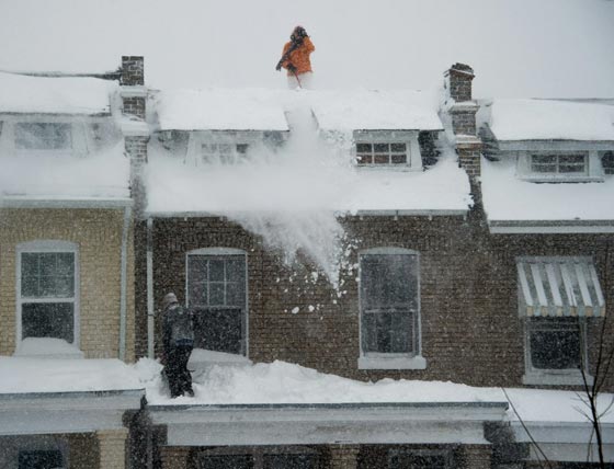 صور عاصفة ثلجية غير مسبوقة توقف الحياة في امريكا صورة رقم 45