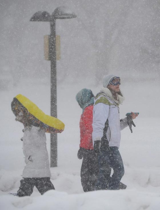 صور عاصفة ثلجية غير مسبوقة توقف الحياة في امريكا صورة رقم 52