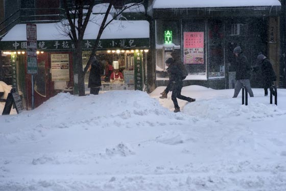 صور عاصفة ثلجية غير مسبوقة توقف الحياة في امريكا صورة رقم 58
