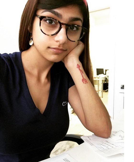 صور وشم ميا خليفة الجديد بالعربية عن الحب الذي قلب حياتها صورة رقم 10