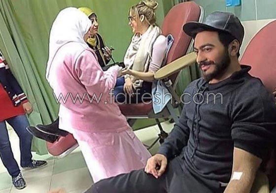 صور تامر حسني مع زوجته بسمة بوسيل يشاركان في حملة التبرع بالدم  صورة رقم 10