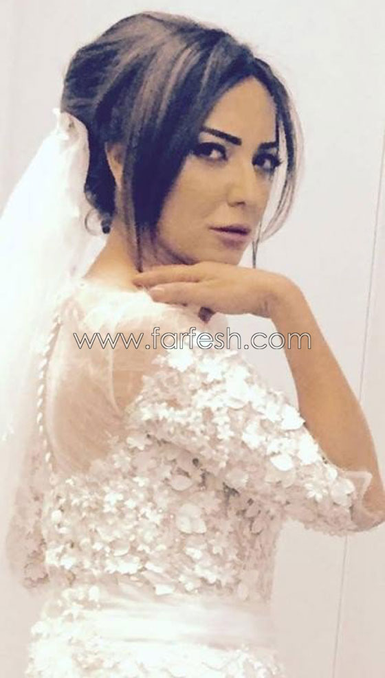 امل عرفة بفستان الزفاف الابيض مجددا بعد طلاقها! صورة رقم 1