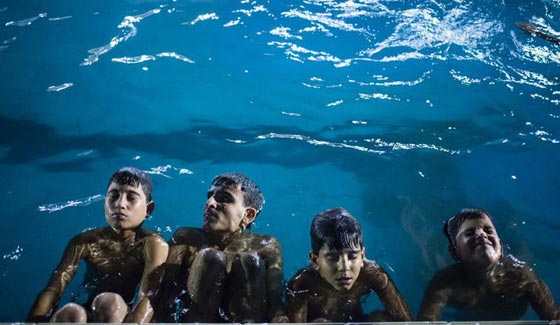 الامل يطرق ابواب ايتام العراق.. في صور تتحدى الموت صورة رقم 2