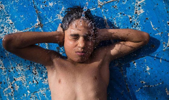 الامل يطرق ابواب ايتام العراق.. في صور تتحدى الموت صورة رقم 8