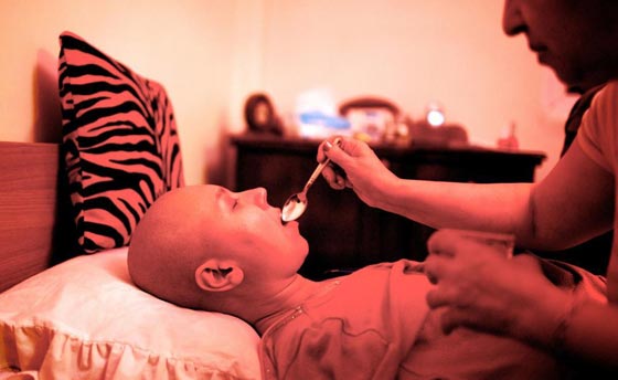 ازمة مالية تتحول الى سرطان يصرع نصف مليون انسان!! صورة رقم 1