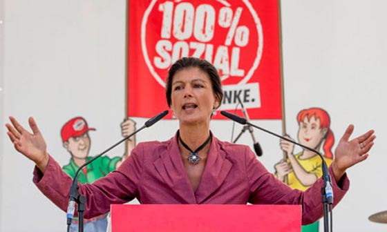 معاقبة عدوة اللاجئين الالمانية بفطيرة من الشوكولاته في وجهها!! صورة رقم 7