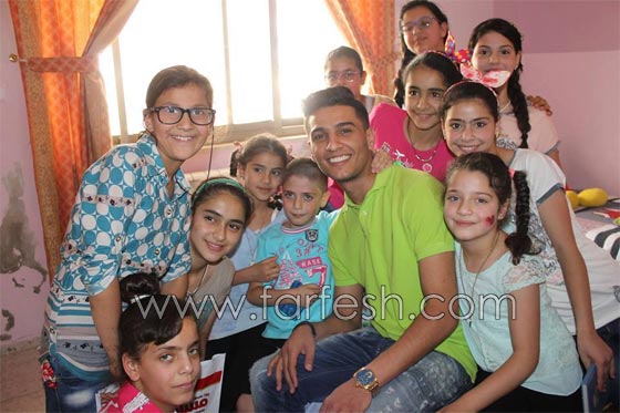 رمضان كريم..  محمد عساف  يتكفل بعشرين طفلا من قرية الايتام  صورة رقم 1