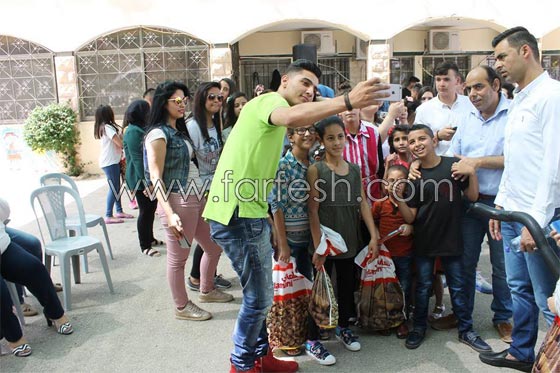 رمضان كريم..  محمد عساف  يتكفل بعشرين طفلا من قرية الايتام  صورة رقم 5