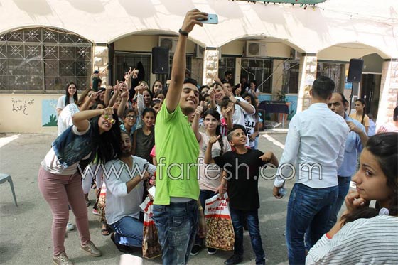 رمضان كريم..  محمد عساف  يتكفل بعشرين طفلا من قرية الايتام  صورة رقم 4