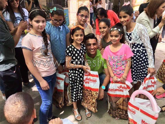 رمضان كريم..  محمد عساف  يتكفل بعشرين طفلا من قرية الايتام  صورة رقم 8