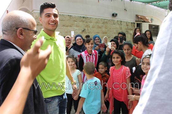 رمضان كريم..  محمد عساف  يتكفل بعشرين طفلا من قرية الايتام  صورة رقم 11