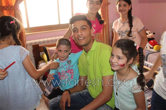 رمضان كريم..  محمد عساف  يتكفل بعشرين طفلا من قرية الايتام  صورة رقم 14