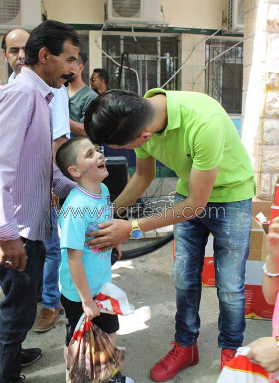 رمضان كريم..  محمد عساف  يتكفل بعشرين طفلا من قرية الايتام  صورة رقم 18