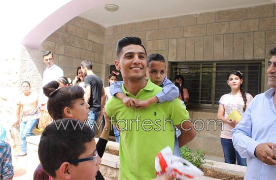 رمضان كريم..  محمد عساف  يتكفل بعشرين طفلا من قرية الايتام  صورة رقم 19
