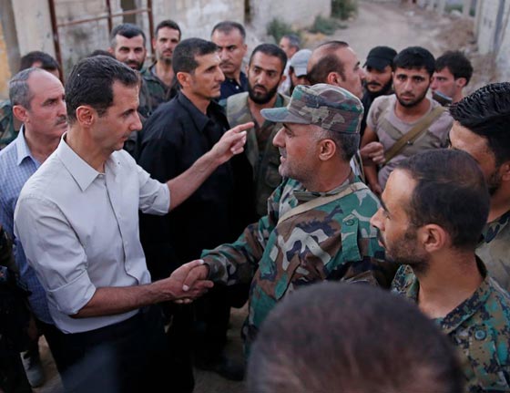 الاسد يتناول الافطار مع جنوده: هذه اطيب لقمة في حياتي!! صورة رقم 4