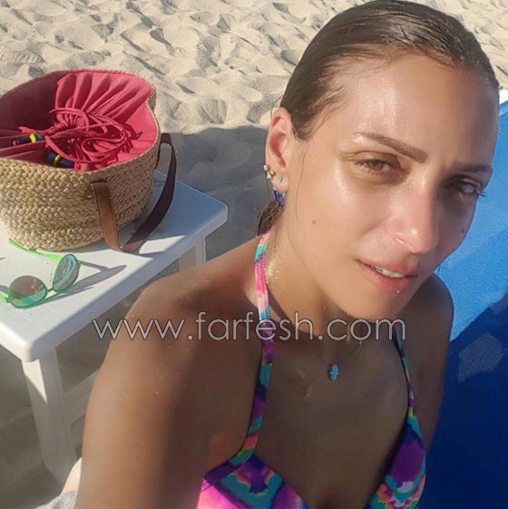 صورة ريم البارودي تستجم بالمايوه على الشاطئ بعد ازمة نسب صورة رقم 1