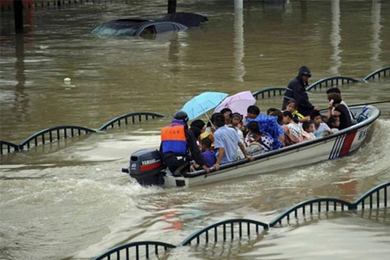 مقتل 114 وفقدان 111صينيا في الفيضانات صورة رقم 9