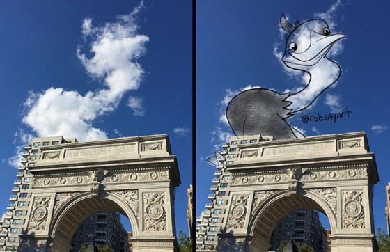  فنان يحلق بين السحب ليرسم شخصيات كرتونية شهيرة صورة رقم 1