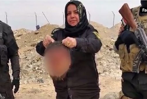  ام هنادي تنتقم لزوجيها ووالدها واشقائها بقطع رؤوس عناصر داعش صورة رقم 5