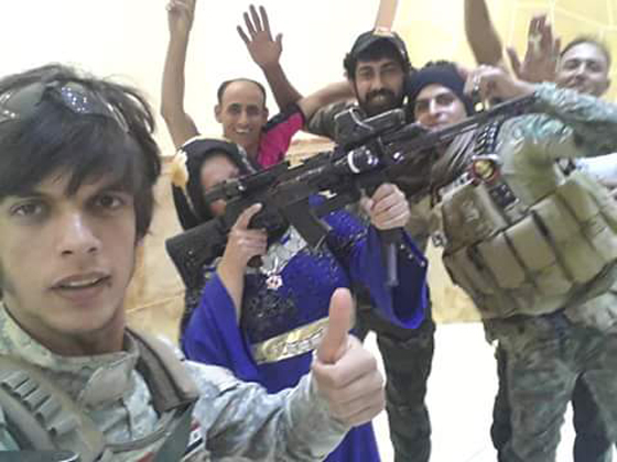  ام هنادي تنتقم لزوجيها ووالدها واشقائها بقطع رؤوس عناصر داعش صورة رقم 9