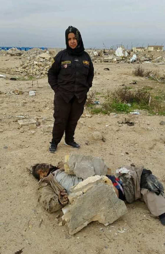  ام هنادي تنتقم لزوجيها ووالدها واشقائها بقطع رؤوس عناصر داعش صورة رقم 11