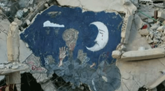 مقاتل في الجيش الحر يرسم الثورة السورية على جدران داريا.. فيديو صورة رقم 7 مقاتل في الجيش الحر يرسم الثورة السورية على جدران داريا.. فيديو صورة رقم 7