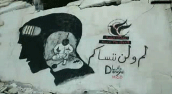 مقاتل في الجيش الحر يرسم الثورة السورية على جدران داريا.. فيديو صورة رقم 8 مقاتل في الجيش الحر يرسم الثورة السورية على جدران داريا.. فيديو صورة رقم 8