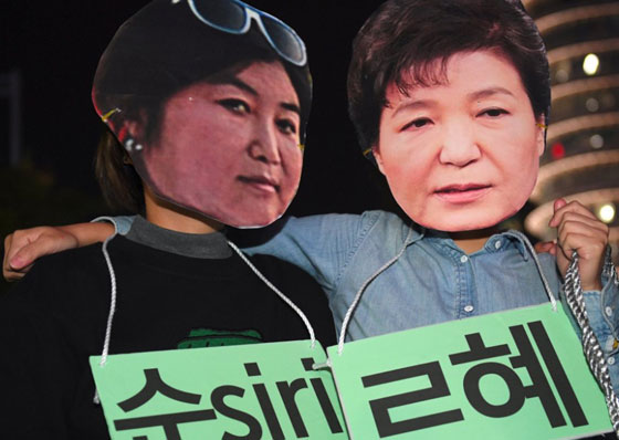 كل التفاصيل حول اكبر فضيحة فساد تهز كوريا الجنوبية والشارع يشتعل! صورة رقم 14